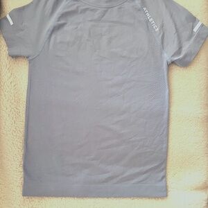 Woman’s seamless yoga T - shirt